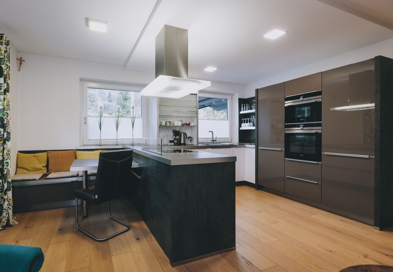 Kitchen in the Kohlis Alpine Home by we rent with mountain view