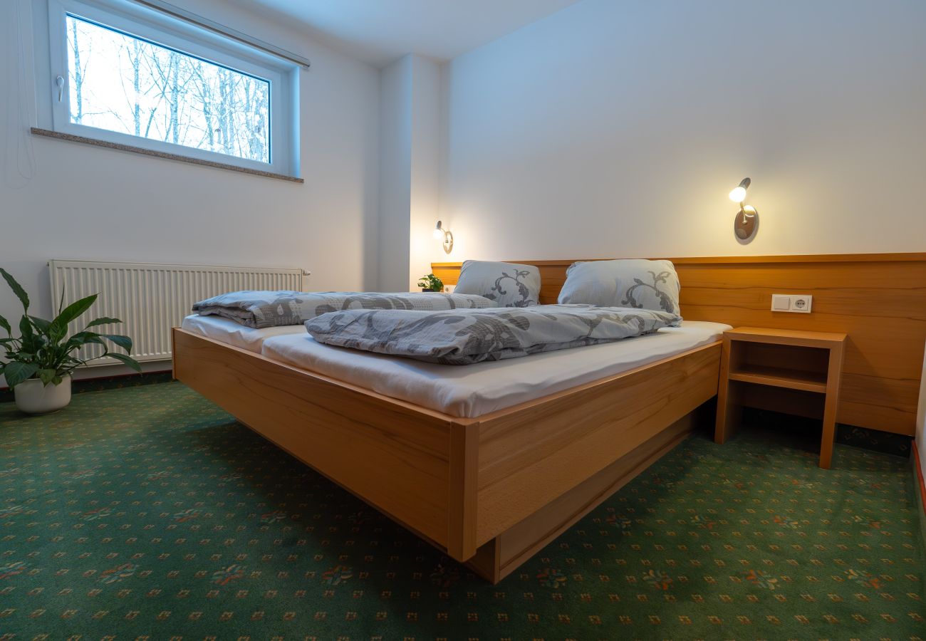 Schlafzimmer im Appartements MaLo by we rent in Viehhofen